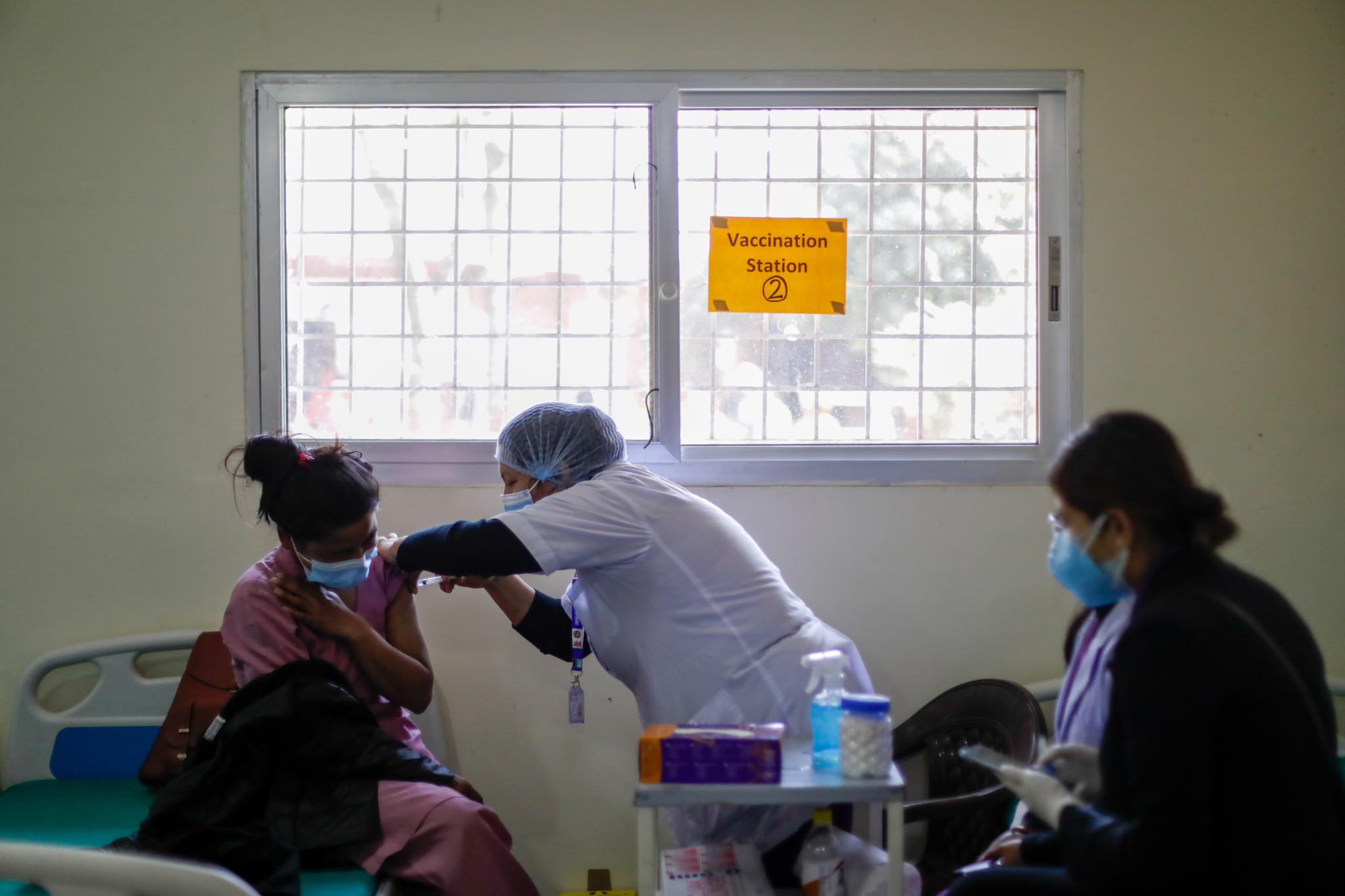 health workers receive covid vaccine